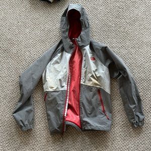 North face rain jacket. Works great but has a couple mud stains